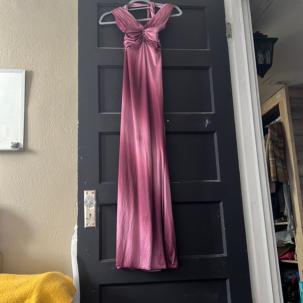 Purple glittery dress. With an open back.
